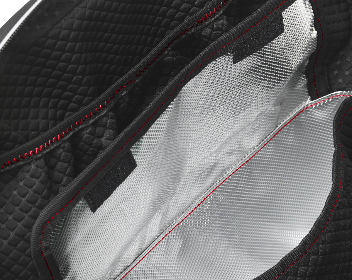 close up of insulated lunch box compartment inside Shirt Shaped backpack by alpha